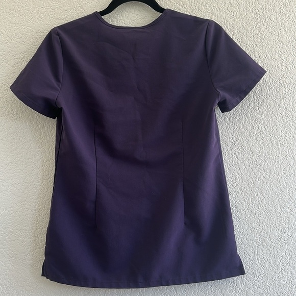 FIGS Purple Shadow Casma Three-Pocket
Scrub Top in Purple Shadow - Picture 4 of 7